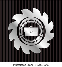 briefcase icon inside silvery shiny emblem