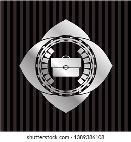 briefcase icon inside silvery shiny badge