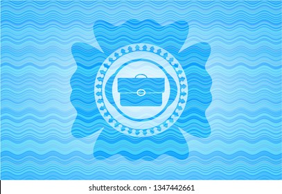 briefcase icon inside sky blue water wave emblem background.