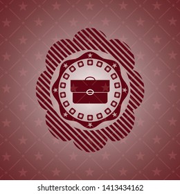 briefcase icon inside vintage red emblem