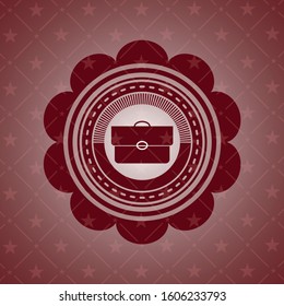 briefcase icon inside vintage red emblem