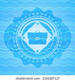 briefcase icon inside water concept badge background. 