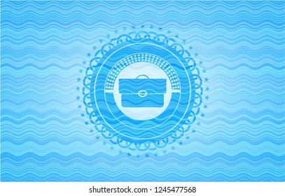 briefcase icon inside water wave concept style emblem.