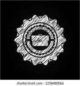 briefcase icon on chalkboard