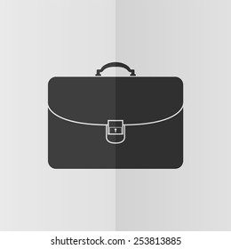 Briefcase vector icon. Effect of folded paper. Flat design