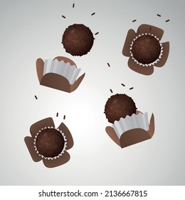 Brigadeiro, the Brazilian chocolate candy. Traditional Brazilian handmade chocolate candy. Falling in motion on white background.