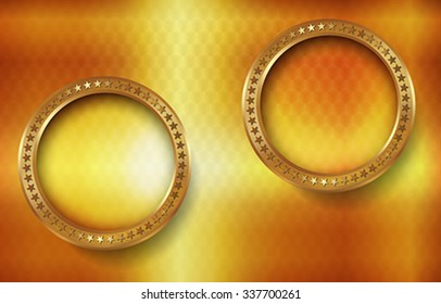 The bright abstract background with gold rings