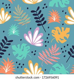 Bright abstract background from various leaves of tropical plants. Creates a summer mood, sets for relaxation and positive.