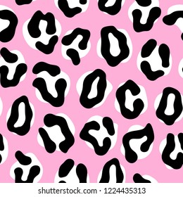 Bright, abstract, fashionable leopard white and black shapes seamless print, pattern. On pink background.