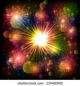 Bright Abstract festive fireworks explosion over black background