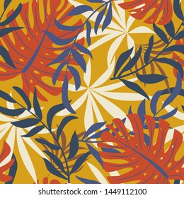 Bright abstract seamless pattern with colorful tropical leaves and plants on orange background. Vector design. Jungle print. Floral background. Printing and textiles. Exotic tropics. Fresh design.