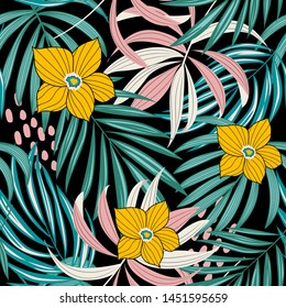 Bright abstract seamless pattern with colorful tropical leaves and flowers on black background. Vector design. Jungle print. Floral background. Printing and textiles. Exotic tropics. Fresh design.