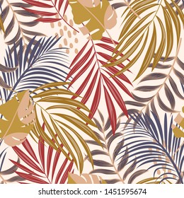 Bright abstract seamless pattern with colorful tropical leaves and flowers on delicate background. Vector design. Jungle print. Floral background. Printing and textiles. Exotic tropics. Fresh design.
