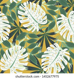Bright abstract seamless pattern with colorful tropical leaves and plants on yellow background. Vector design. Jungle print. Floral background. Printing and textiles. Exotic tropics. Fresh design.