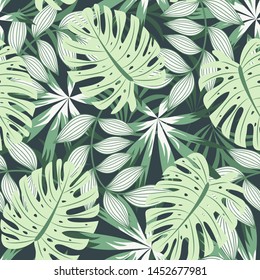 Bright abstract seamless pattern with colorful tropical leaves and plants on green background. Vector design. Jungle print. Floral background. Printing and textiles. Exotic tropics. Fresh design.