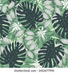 Bright abstract seamless pattern with colorful tropical leaves and plants on green background. Vector design. Jungle print. Floral background. Printing and textiles. Exotic tropics. Fresh design.