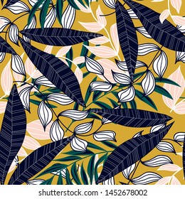 Bright abstract seamless pattern with colorful tropical leaves and plants on yellow background. Vector design. Jungle print. Floral background. Printing and textiles. Exotic tropics. Fresh design.