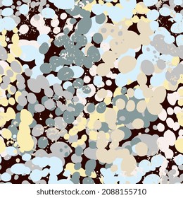 Bright abstract seamless pattern with stains, splashes of paint and candy. Festive background