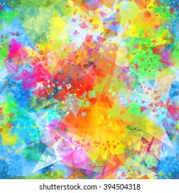 Bright abstract vector background. Seamless pattern of colored transparent triangles. The effect of blur and watercolors.