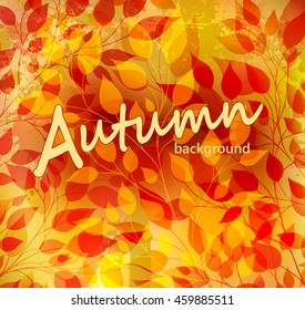 Bright autumn abstract background with casebound leaves and branches