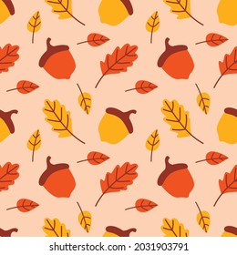 A bright autumn illustration with yellow and orange oak leaves, acorns on a beige background. Vector seamless pattern for gift paper, fabric, wallpaper, packaging, etc.