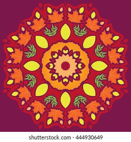 Bright autumn mandala made of colorful leaves