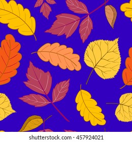 Bright autumn seamless pattern with different leaves on a dark blue background.Design for web pages,cloth,textile,wrapping paper,scrapbooking,Wallpapers.