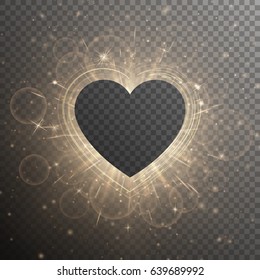 Bright background with brilliant light. Frame of a gold glitter heart on a transparent backdrop.