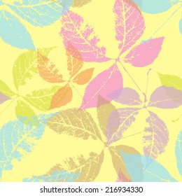 Bright background made of fallen autumn leaves, seamless pattern on white background. Vector.