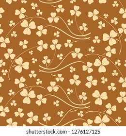 bright beige seamless pattern for saint patrick day - vector background with shamrock