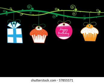 bright birthday decorations hanging from branches on black with space for text