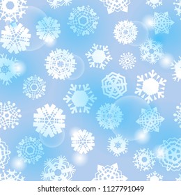 Bright blue background with snowflakes. Vector snowfall winter pattern. Snow falling illustration for Christmas design