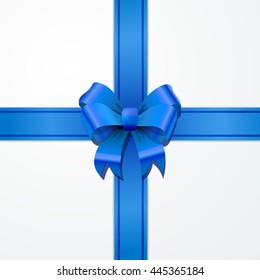Bright blue bow-knot with tape with shadow on white