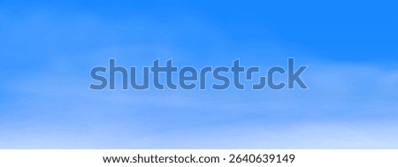Bright blue sky filled with white fluffy clouds on a clear sunny day. Sky background wide. Light cloudy texture. Sunny day. Summer blue sky banner concept.