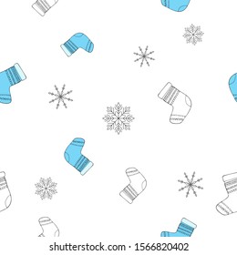 Bright blue sock with decor and geometric snowflakes on white background. Seamless winter pattern.