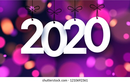 Bright blurred 2020 New Year card with color lights. Vector background.
