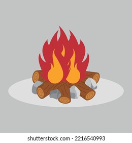 A bright bonfire with firewood and stones.