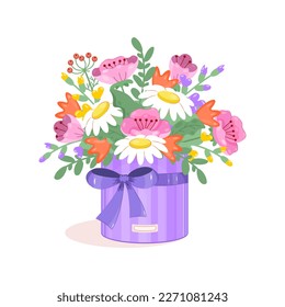 Bright bouquet of flowers in a festive box with a bow