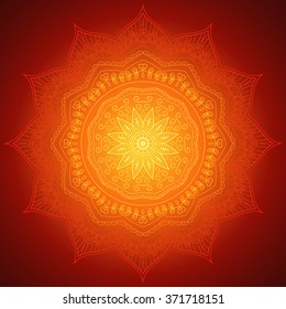 Bright, burning sun-mandala in the yellow-orange tones.