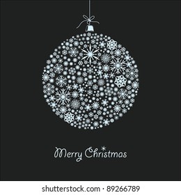 Bright Christmas ball against dark background. Vectorized "Merry Christmas" text on design.