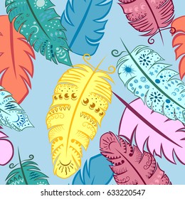 Bright colored feathers on a blue background. Vector for seamless illustration.