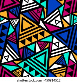 Bright colored seamless pattern in boho chic style. Abstract background with aztec motives. Ethnic print template for fabric and paper. Summer fashion.