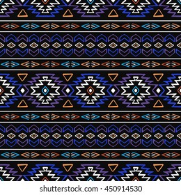 Bright colored seamless pattern in boho chic style. Abstract background with aztec ornament. Hand drawn ethnic print template for fabric and paper. Summer fashion.