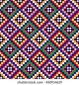 Bright colored seamless pattern in boho chic style. Abstract background with aztec ornament. Ethnic print template for fabric and paper. Summer fashion.