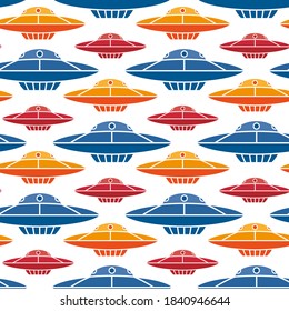 Bright colorful colored flying saucers isolated on white background. Cute ufo seamless pattern. Horizontal view. Vector flat graphic illustration. Texture.