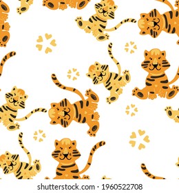 Patrón transparente y colorido con animales exóticos. Tigres amables. Patrón de la jungla natural. Estilo infantil.Símbolo de 2022