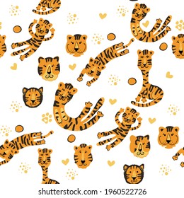 Patrón transparente y colorido con animales exóticos. Tigres amables. Patrón de la jungla natural. Estilo infantil.Símbolo de 2022