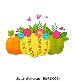 Bright composition of pumpkins and flowers.