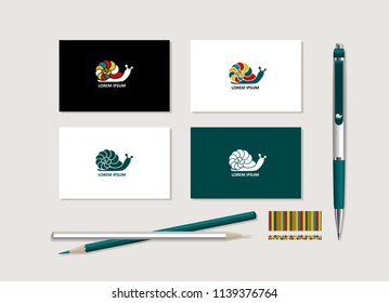 The bright corporate style with snail. Samples of business cards, a pen, a flash card, a pencil. Vector.