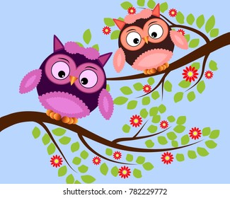Bright cute cartoon owls sit on the flowering branches of fantastic trees
